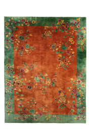 Antique Chinese decorative rug by Nichols, 136x104 inches, featuring intricate green and orange patterns.